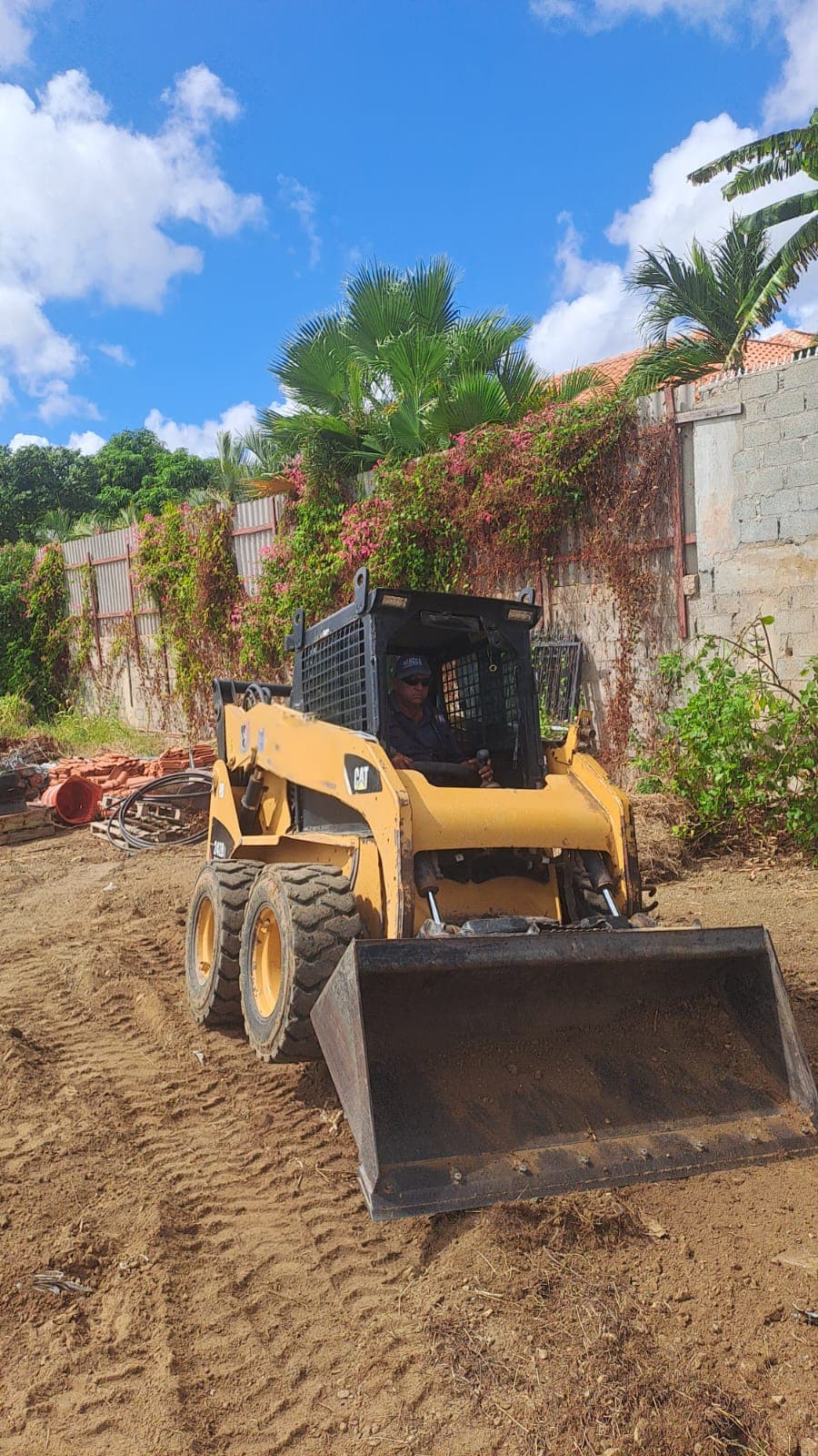 CAT 242B3 Skid Steer on job site Curacao